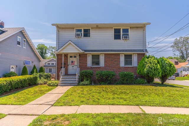 137 Safran Ave, Edison, NJ 08837 - view of front of house with brick siding and a front lawn
