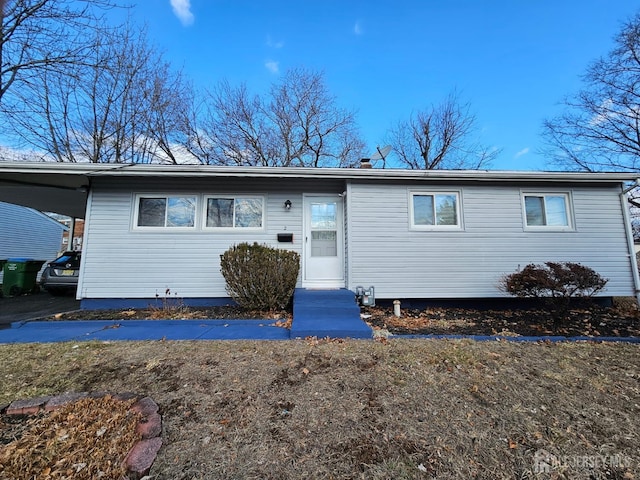 2 Brookside Rd, Edison, NJ 08817 - view of front facade with a carport
