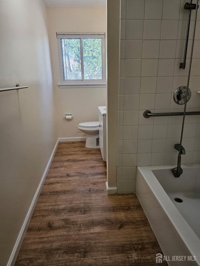 2 Brookside Rd, Edison, NJ 08817 - full bath with toilet, wood finished floors, vanity, baseboards, and  shower combination