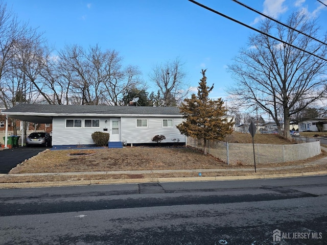2 Brookside Rd, Edison, NJ 08817 - view of front of home with an attached carport and asphalt driveway
