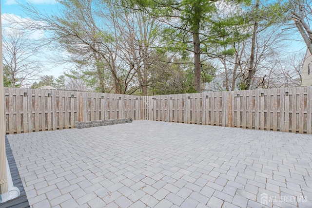 view of patio featuring a fenced backyard
