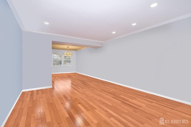 unfurnished room with ornamental molding, a chandelier, baseboards, light wood-style floors, and recessed lighting