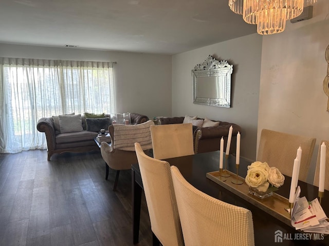 1202 Harbor Club Dr, Sayreville, NJ 08859 - dining room with dark wood-style flooring and an inviting chandelier