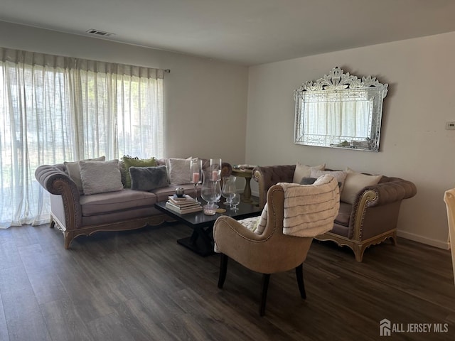 1202 Harbor Club Dr, Sayreville, NJ 08859 - living room with baseboards, visible vents, and dark wood-type flooring