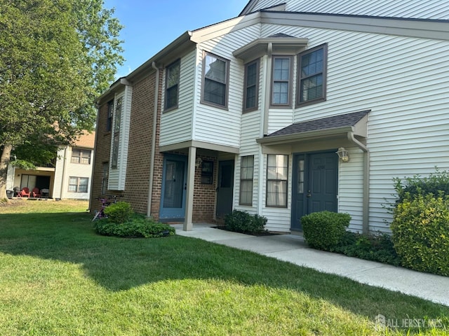 1202 Harbor Club Dr, Sayreville, NJ 08859 - multi unit property with brick siding and a front lawn