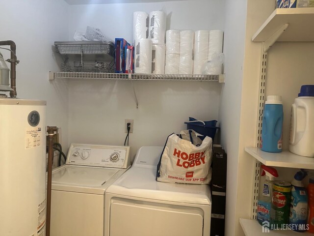 1202 Harbor Club Dr, Sayreville, NJ 08859 - laundry room with water heater, separate washer and dryer, and laundry area