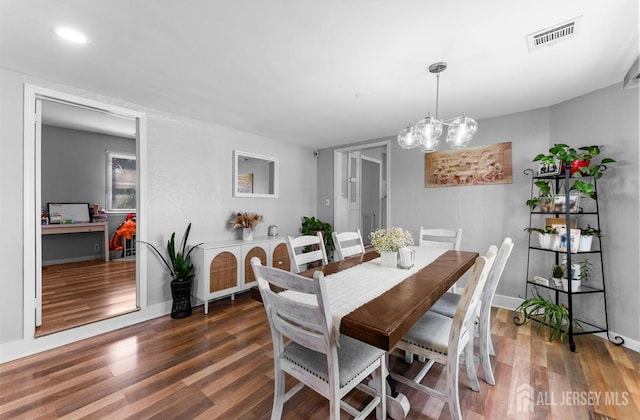 40 Highland St, East Brunswick, NJ 08816 - dining area featuring a chandelier, wood finished floors, and recessed lighting