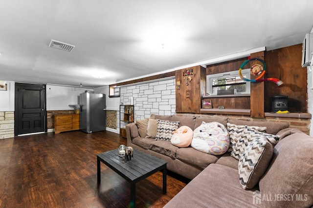 40 Highland St, East Brunswick, NJ 08816 - living room with wood finished floors and wooden walls
