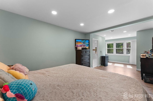 40 Highland St, East Brunswick, NJ 08816 - bedroom featuring wood finished floors and recessed lighting
