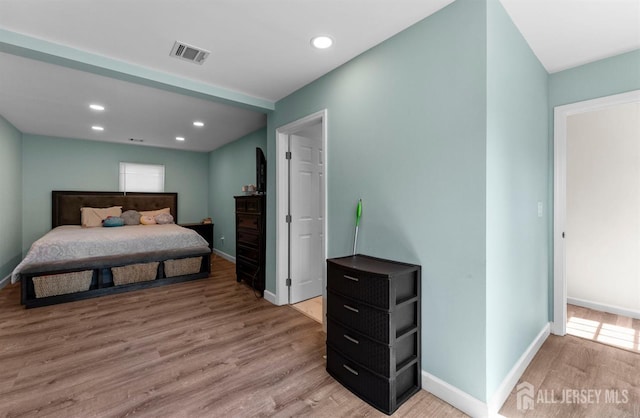 40 Highland St, East Brunswick, NJ 08816 - bedroom with light wood-style floors and recessed lighting