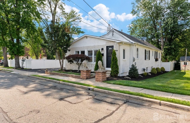 40 Highland St, East Brunswick, NJ 08816 - view of front facade featuring stucco siding