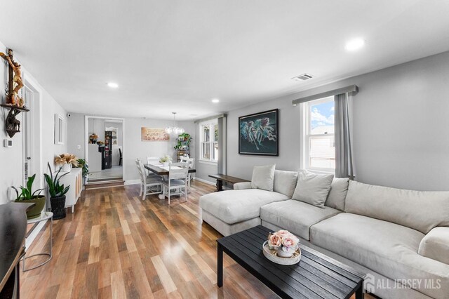 40 Highland St, East Brunswick, NJ 08816 - living room with recessed lighting and wood finished floors