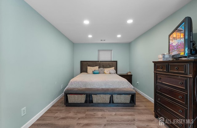 40 Highland St, East Brunswick, NJ 08816 - bedroom with recessed lighting and light wood-style floors