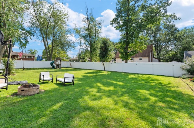 40 Highland St, East Brunswick, NJ 08816 - view of yard featuring a fire pit