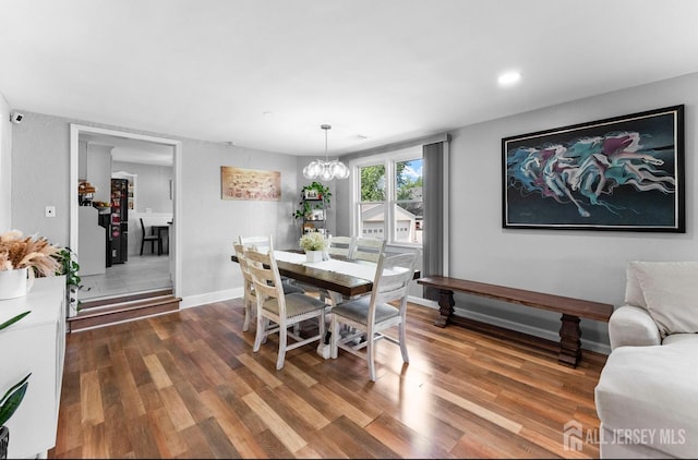 40 Highland St, East Brunswick, NJ 08816 - dining room with wood finished floors and a chandelier