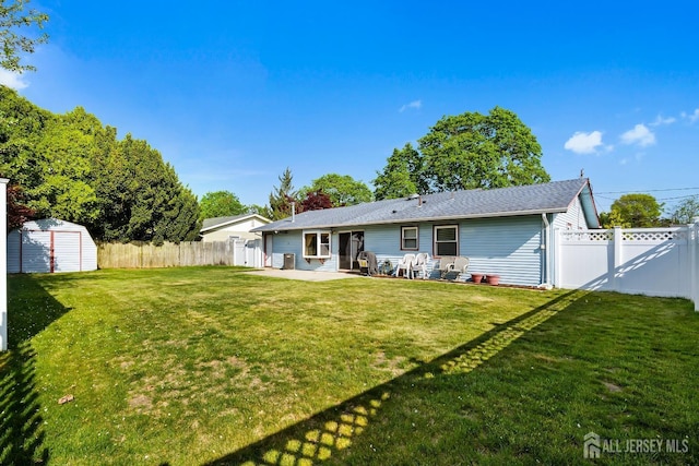 32 Drake Ave, Monroe, NJ 08831 - rear view of house featuring a patio area