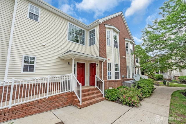 116 Forest Dr, Piscataway, NJ 08854 - traditional-style home with brick siding