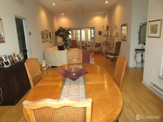 dining room with light wood-type flooring, recessed lighting, and ceiling fan