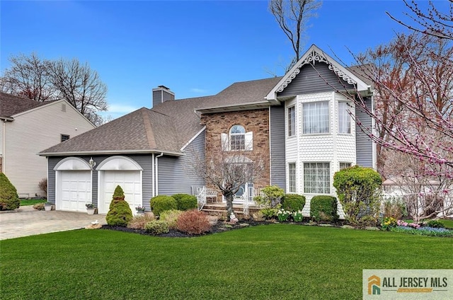 view of front of property featuring a garage, a front yard, roof with shingles, a chimney, and driveway