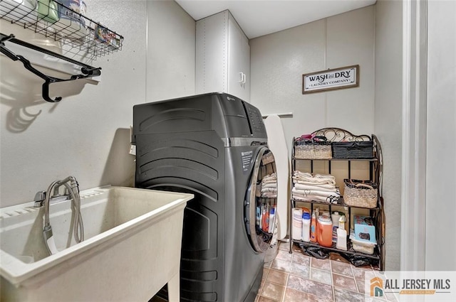 laundry room with washer and dryer
