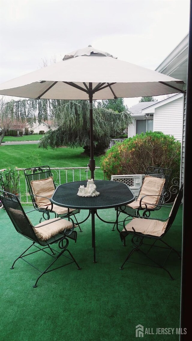 view of patio with outdoor dining space