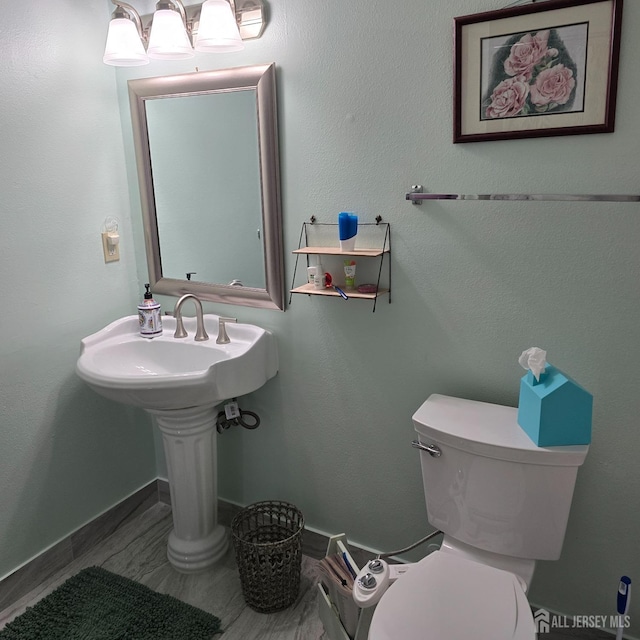 bathroom featuring toilet