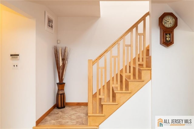 stairway with baseboards