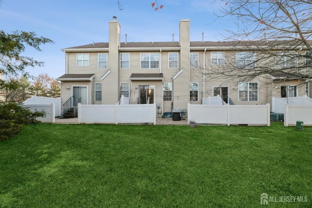 1404 Yarrow Cir S, Brunswick, NJ 08810 - rear view of house with a chimney