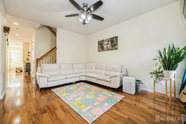 1404 Yarrow Cir S, Brunswick, NJ 08810 - living area featuring hardwood / wood-style floors, stairs, and ceiling fan