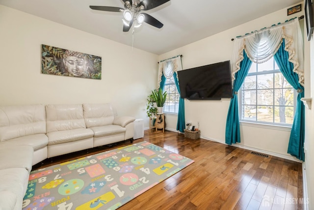 1404 Yarrow Cir S, Brunswick, NJ 08810 - living room featuring wood finished floors and ceiling fan