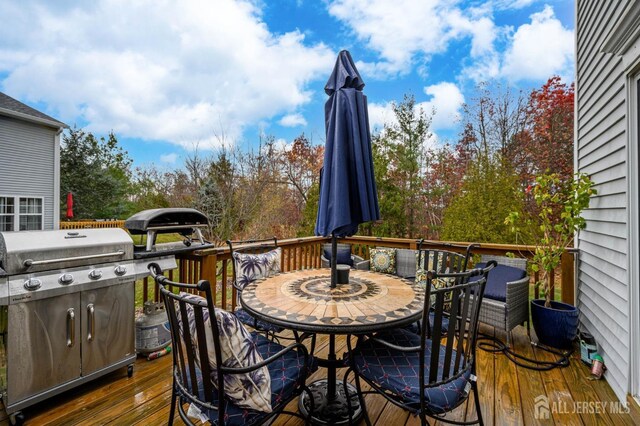 29 Chimney Ct, Old Bridge, NJ 08879 - wooden deck with outdoor dining area