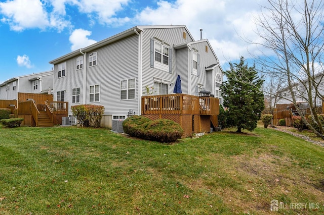 29 Chimney Ct, Old Bridge, NJ 08879 - back of property featuring a deck, a yard, and central AC