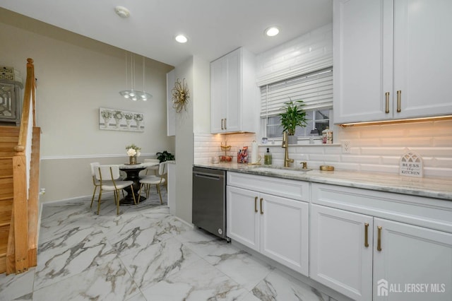 29 Chimney Ct, Old Bridge, NJ 08879 - kitchen featuring stainless steel dishwasher, a sink, tasteful backsplash, white cabinets, and light stone counters