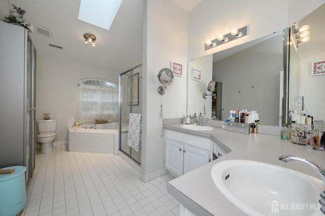 29 Chimney Ct, Old Bridge, NJ 08879 - bathroom featuring a skylight, tile patterned flooring, toilet, a bath, and double vanity