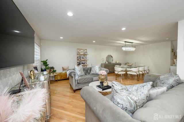 29 Chimney Ct, Old Bridge, NJ 08879 - living room featuring light wood finished floors, recessed lighting, and a chandelier