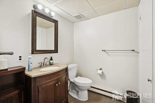 9 Valley Forge Dr, East Brunswick, NJ 08816 - bathroom featuring a baseboard radiator, vanity, and a paneled ceiling