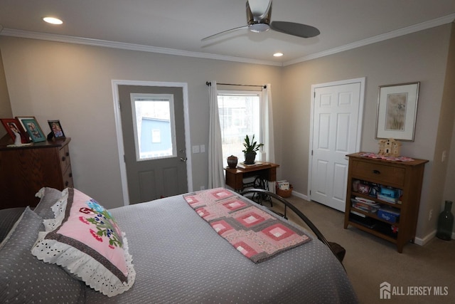 carpeted bedroom featuring recessed lighting, baseboards, and ornamental molding