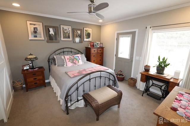 bedroom featuring recessed lighting, light colored carpet, crown molding, and a ceiling fan