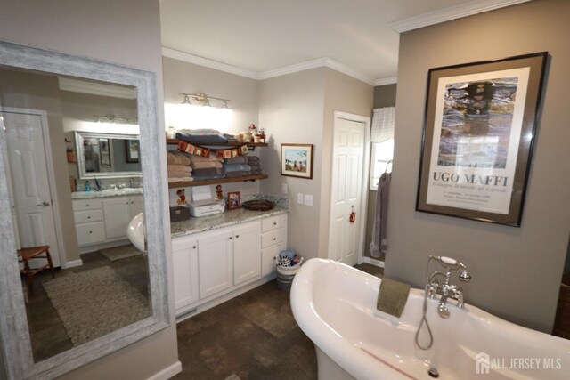 106 E Moss Mill Rd E Unit T-34, Galloway, NJ 08205 - bathroom featuring ornamental molding, a soaking tub, and vanity