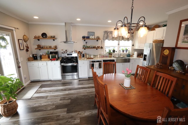 dining space featuring crown molding, plenty of natural light, and dark wood-style flooring