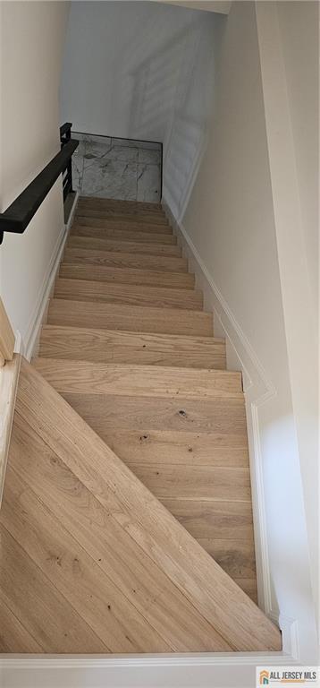 374 Oak St, Perth Amboy, NJ 08861 - stairway with wood finished floors