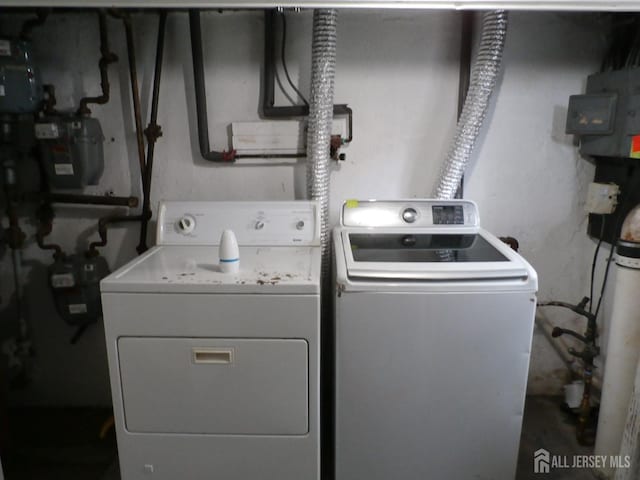 laundry area with laundry area and washer and dryer