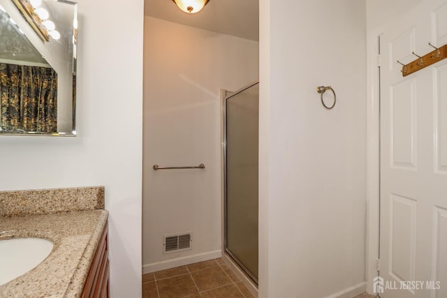 8 Staudt Ct, Franklin, NJ 08873 - bathroom with a stall shower, vanity, and tile patterned flooring