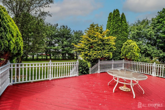 8 Staudt Ct, Franklin, NJ 08873 - wooden deck with a yard and view of scattered trees