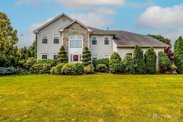 8 Staudt Ct, Franklin, NJ 08873 - colonial-style house featuring a front lawn and stone siding