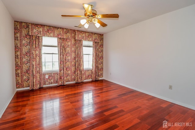 8 Staudt Ct, Franklin, NJ 08873 - spare room featuring wood finished floors, ceiling fan, and wallpapered walls