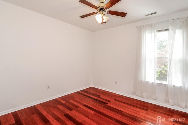 8 Staudt Ct, Franklin, NJ 08873 - empty room featuring dark wood finished floors and a ceiling fan