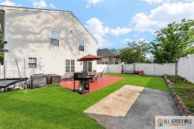 19 Edgegrove St, Edison, NJ 08837 - back of house with a fenced backyard and a patio