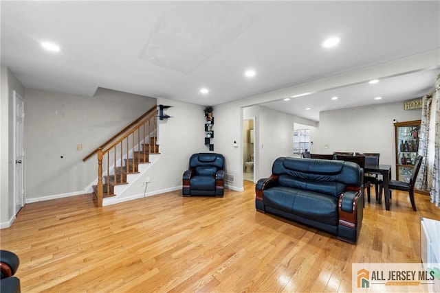 19 Edgegrove St, Edison, NJ 08837 - living room with wood finished floors, stairway, and recessed lighting