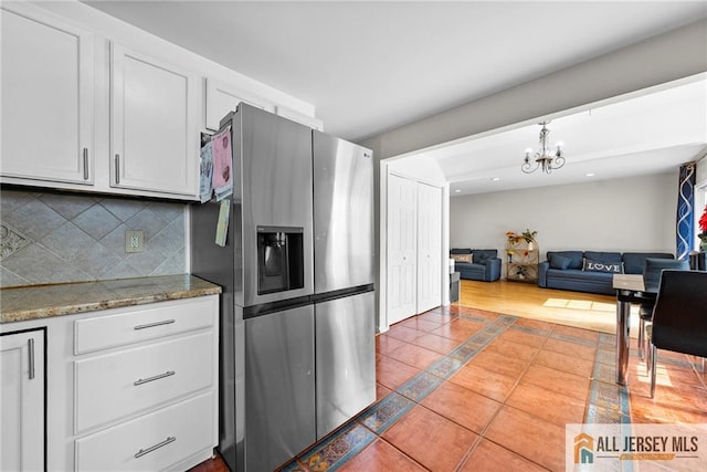 19 Edgegrove St, Edison, NJ 08837 - kitchen featuring stainless steel fridge with ice dispenser, backsplash, a chandelier, white cabinetry, and recessed lighting